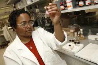 Black woman working in lab